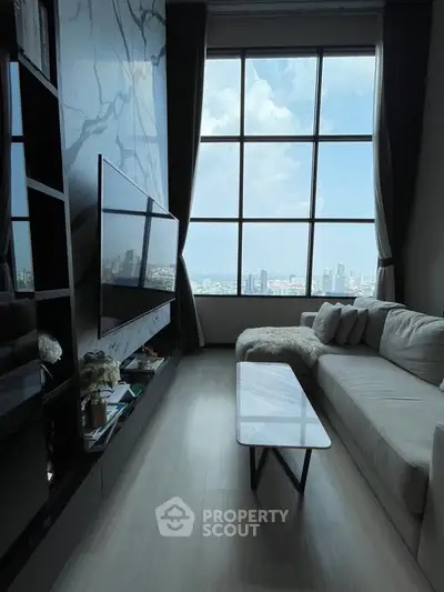 Luxurious living room with stunning city view and modern decor