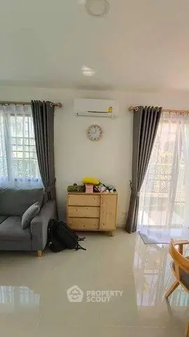 Cozy living room with modern decor and natural light