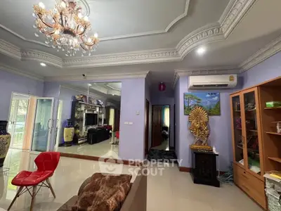 Luxurious living room with elegant chandelier and modern decor