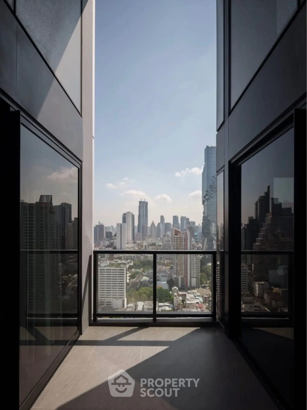 Stunning urban view from a high-rise balcony with city skyline