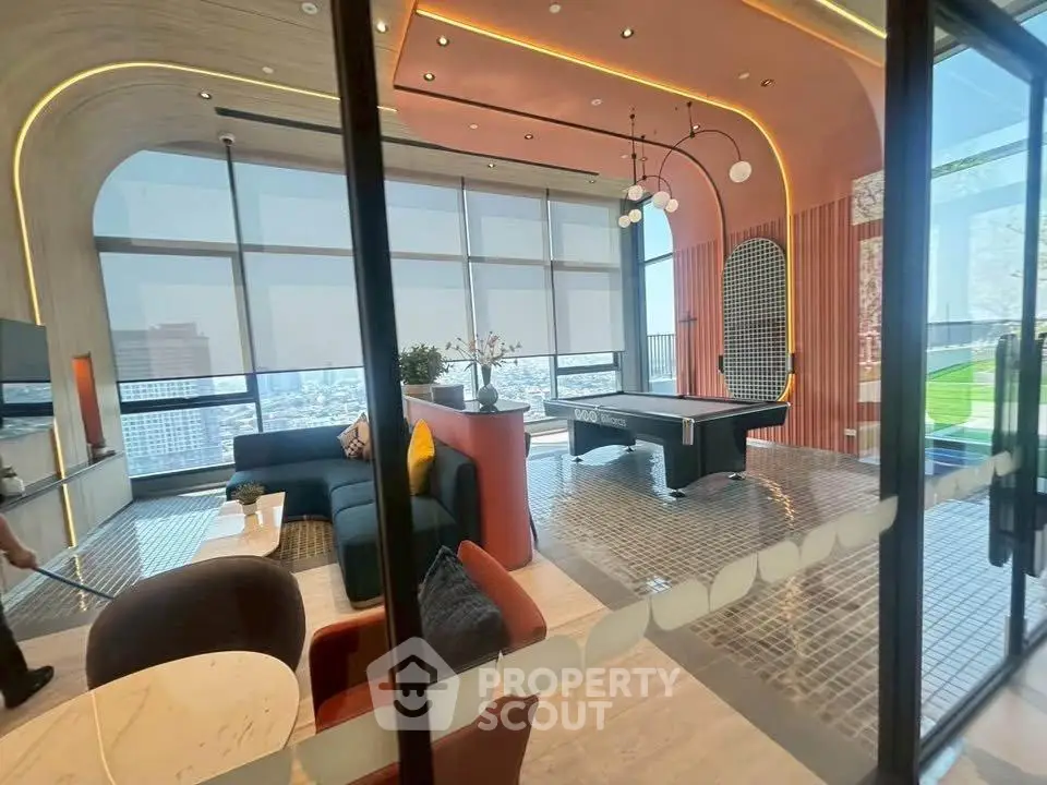 Luxurious modern living room with panoramic city views and stylish interior design.