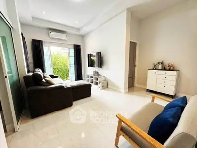 Spacious modern living room with sleek furniture and natural light