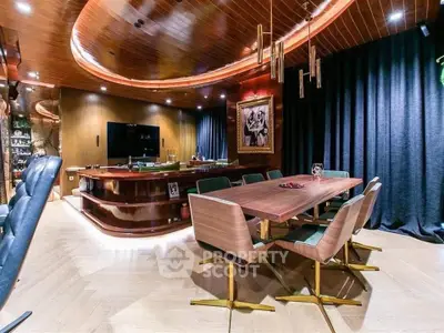 Luxurious modern living room with elegant dining area and stylish lighting