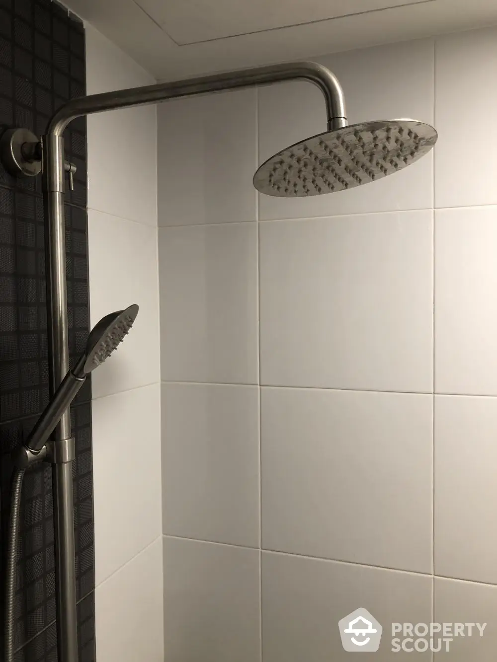 Modern bathroom shower with sleek design and rainfall showerhead