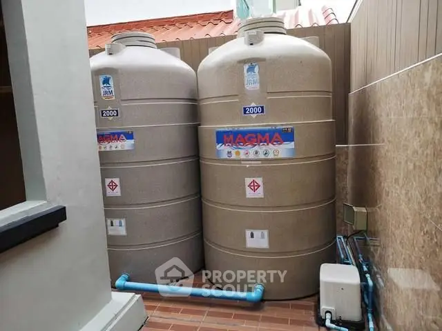 Outdoor water storage tanks in a residential property