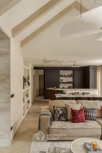 Elegant living room with modern open kitchen and stylish decor