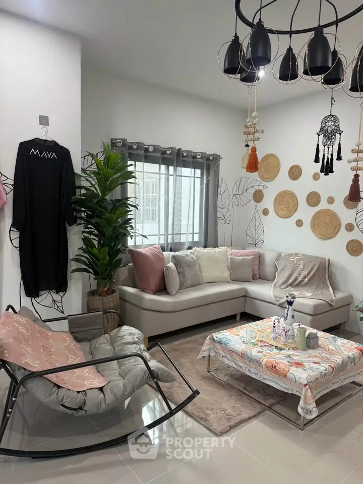 Chic living room with modern decor, cozy sectional sofa, and stylish lighting