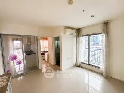 Bright living room with balcony view in modern apartment