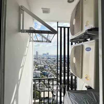 High-rise balcony with city view and air conditioning units, perfect for urban living.