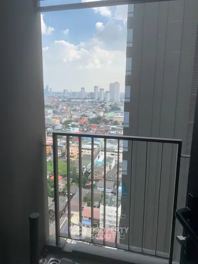 Stunning cityscape view from a modern high-rise balcony, perfect for urban living enthusiasts.