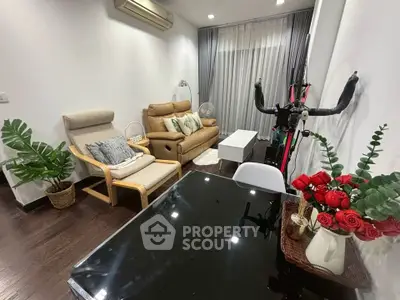 Charming living room with modern furniture and elegant decor, perfect for relaxation and entertaining.