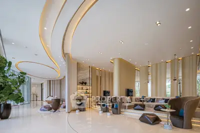 Luxurious modern living room with elegant design and spacious layout, featuring stylish furniture and ambient lighting.