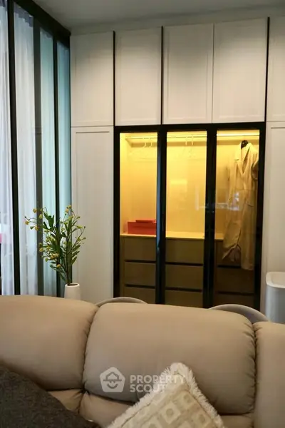 Luxurious living room with walk-in closet and elegant decor