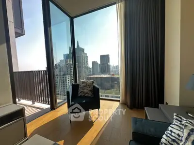 Modern living room with floor-to-ceiling windows offering stunning city views and abundant natural light.