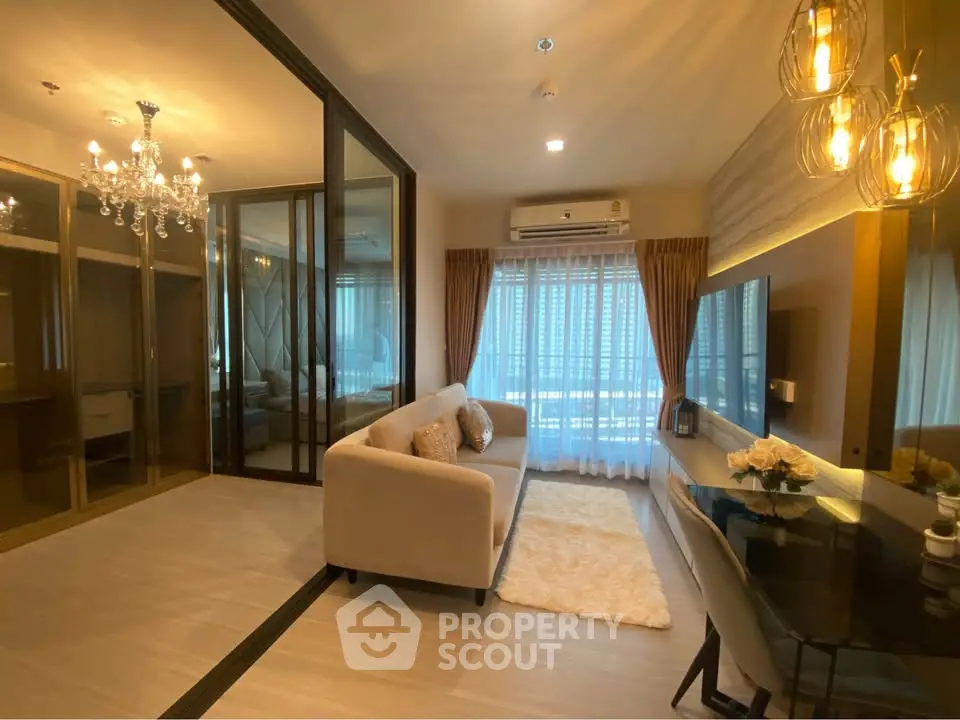 Luxurious modern living room with elegant lighting and plush furnishings in a high-end apartment.