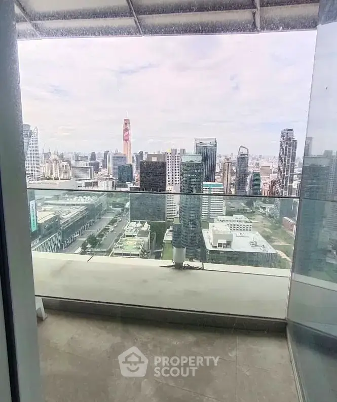 Stunning cityscape view from a modern high-rise balcony, perfect for urban living enthusiasts.
