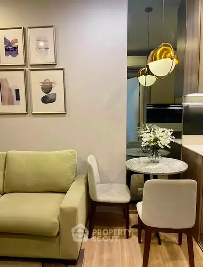 Chic modern living room with cozy seating and elegant dining area, perfect for urban living.