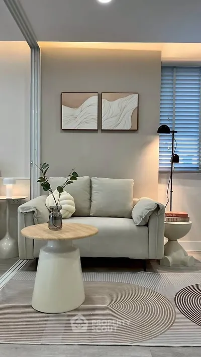 Modern living room with stylish decor and cozy seating area