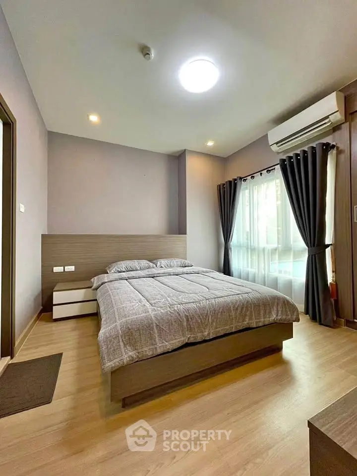 Modern bedroom with cozy decor and natural light