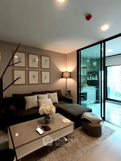 Modern living room with cozy sofa and elegant decor in a stylish apartment.