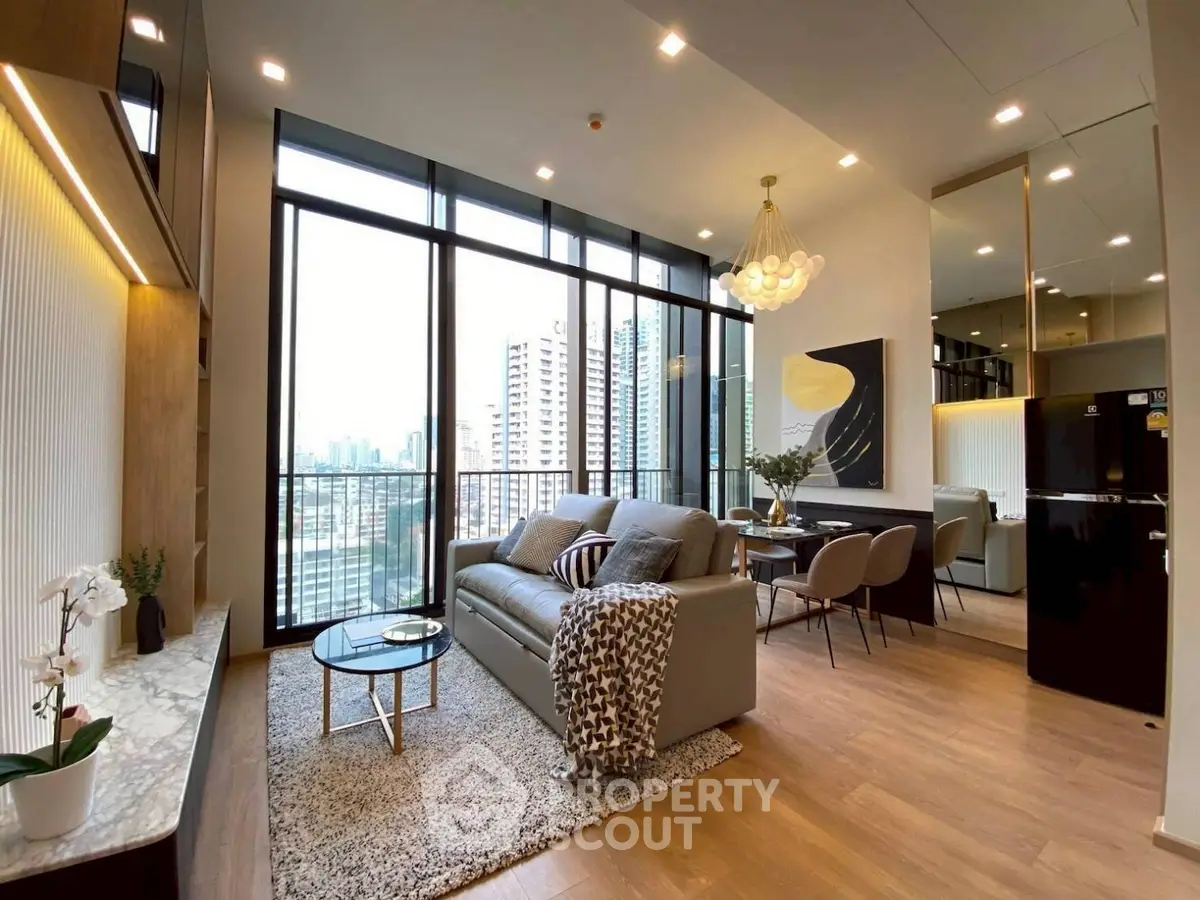 Luxurious modern living room with floor-to-ceiling windows and city view