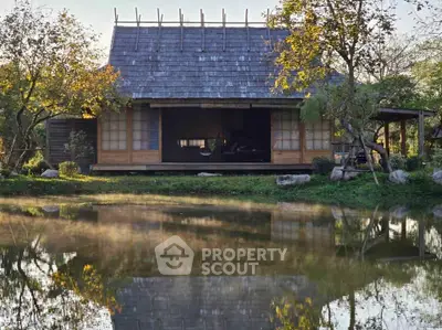 Charming rustic lakeside cabin with serene natural surroundings and traditional architecture.