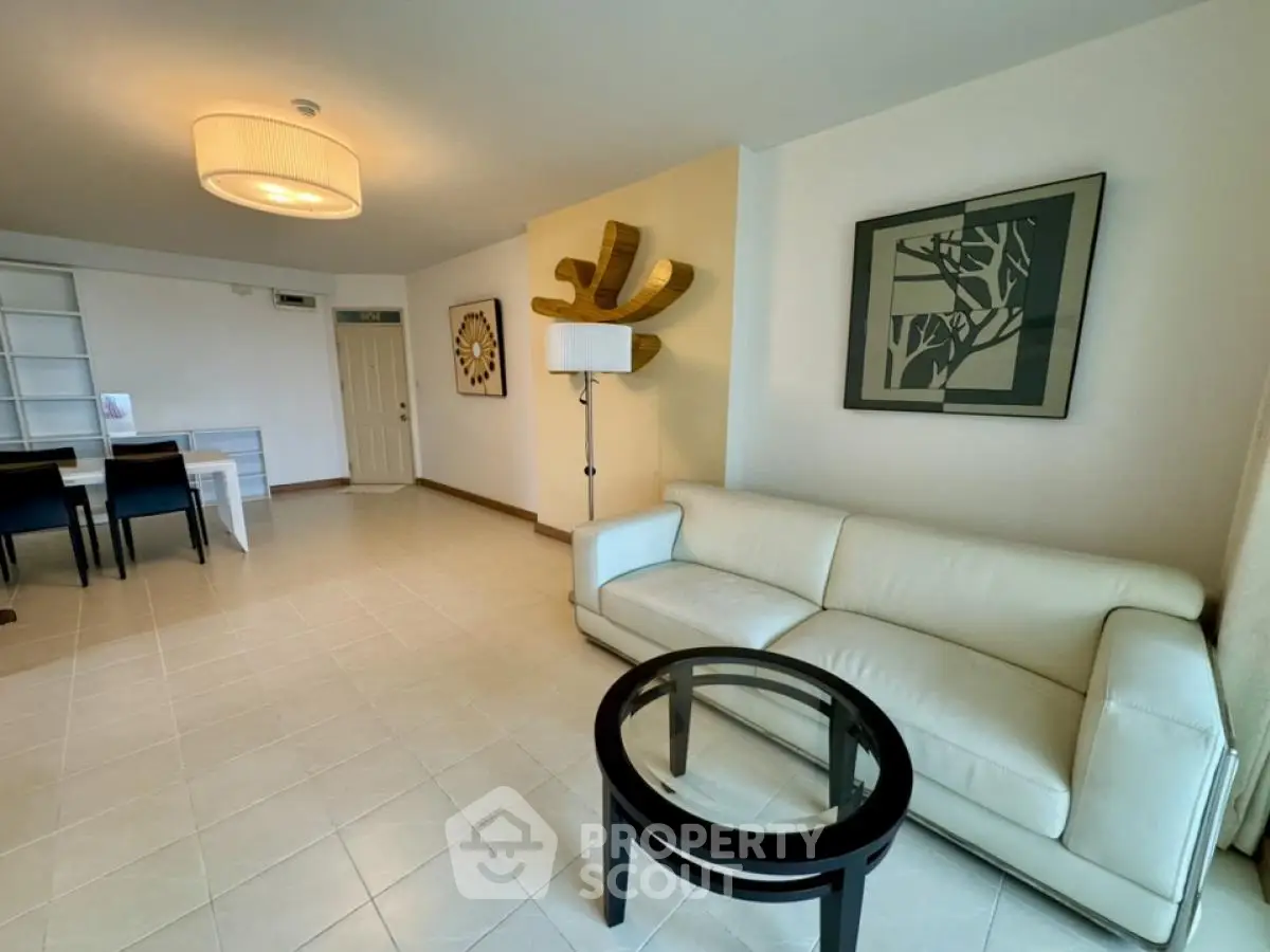 Spacious modern living room with elegant decor and comfortable seating