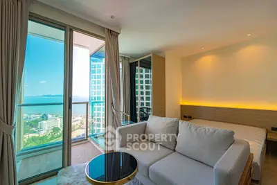 Luxurious condo with stunning ocean view and spacious balcony, perfect for modern living.