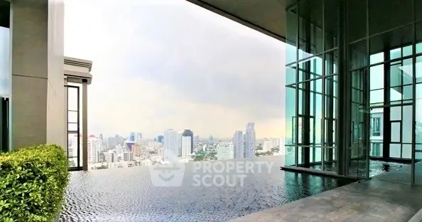 Luxurious rooftop infinity pool with stunning city skyline view