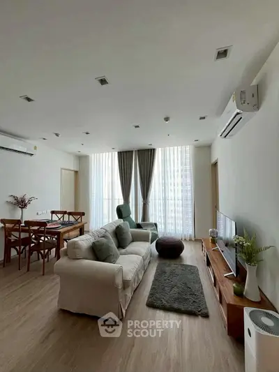 Spacious modern living room with elegant decor and natural light