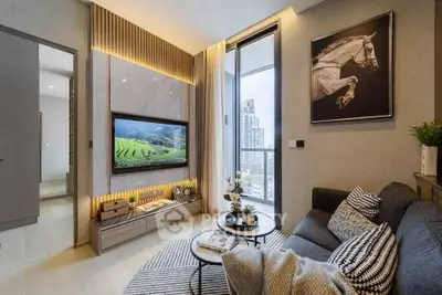 Modern living room with city view, stylish decor, and cozy seating area.