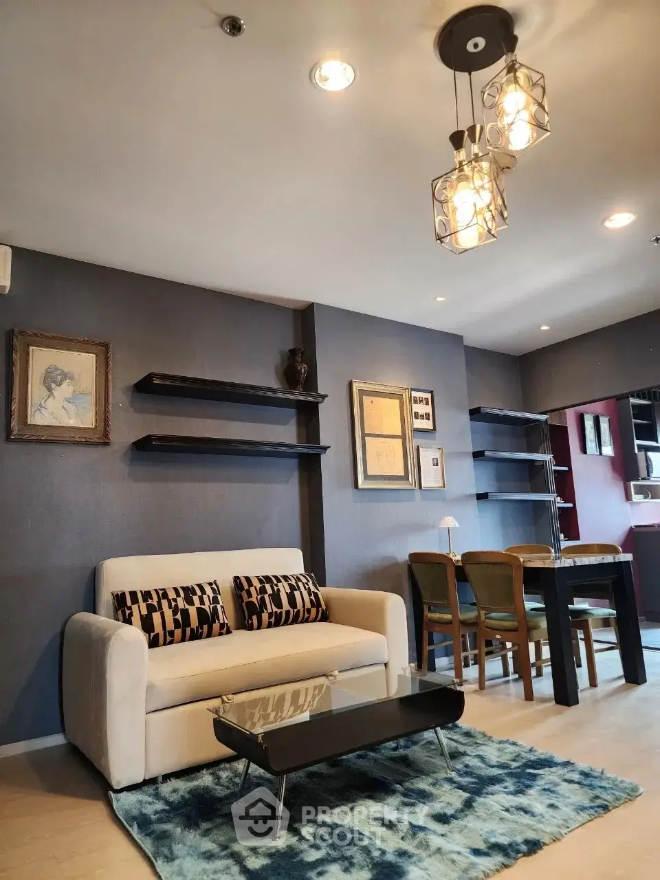 Stylish living room with modern decor and elegant lighting in a contemporary apartment.