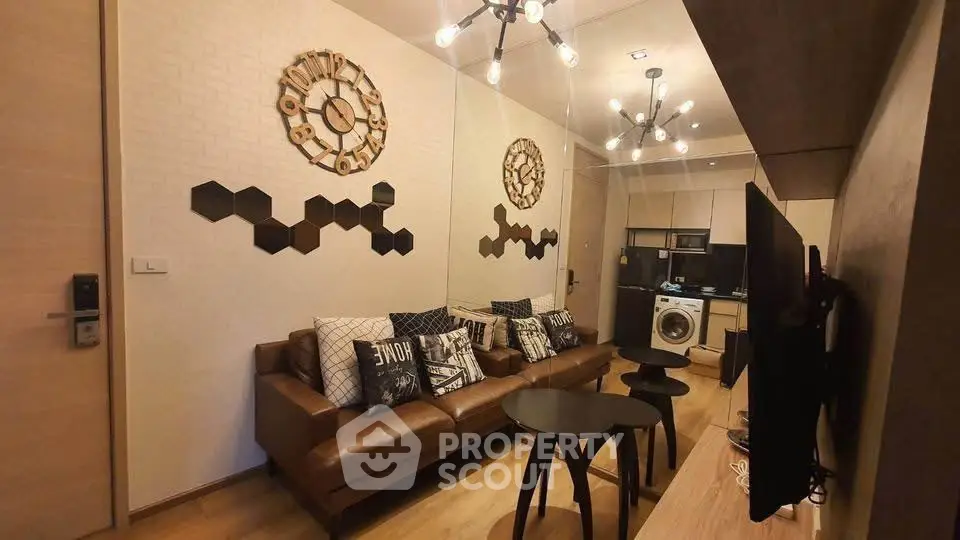 Modern living room with stylish decor and open kitchen layout