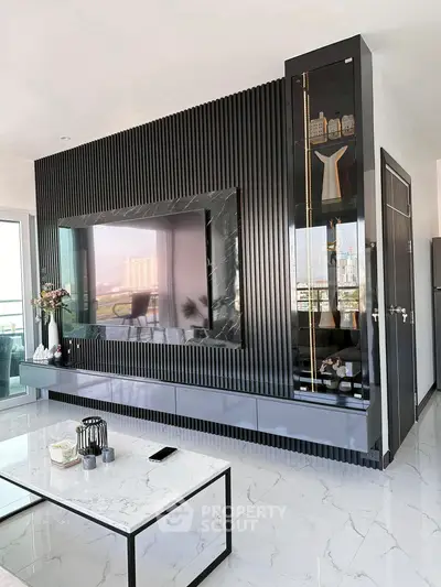 Luxurious modern living room with sleek TV unit and panoramic city view.