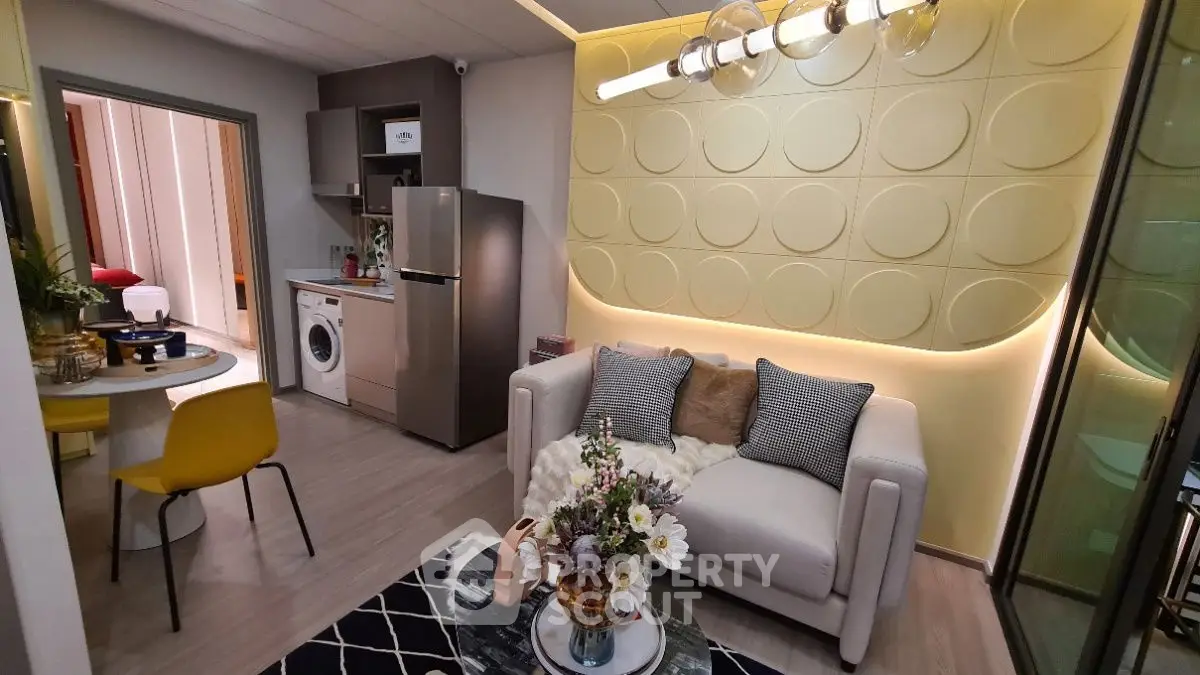 Modern living room with stylish decor and open kitchen layout