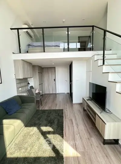 Modern loft apartment with mezzanine bedroom and stylish living area