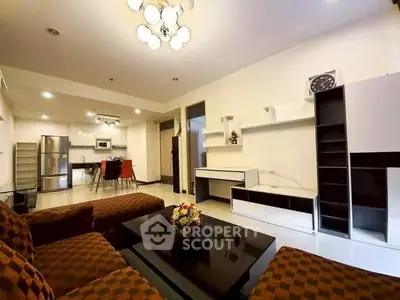 Spacious modern living room with open kitchen and stylish furniture