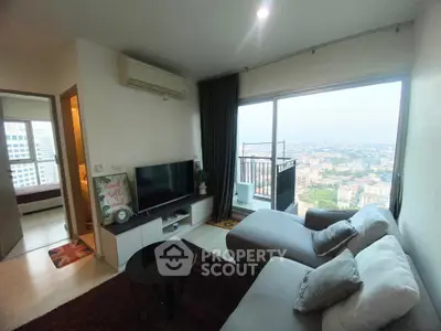 Modern living room with panoramic city view and cozy seating area