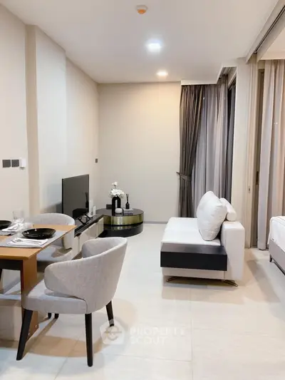 Modern living room with sleek furniture and open layout in a stylish apartment