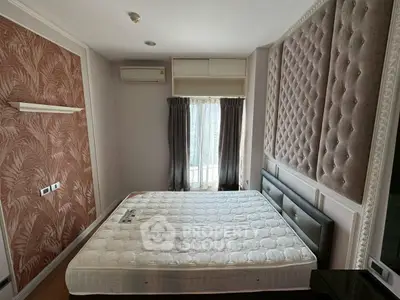 Luxurious bedroom with elegant wall design and large window for natural light