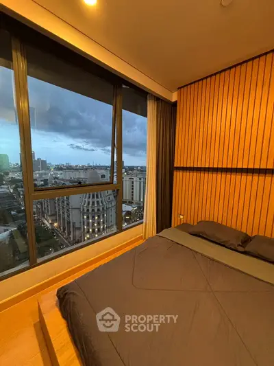 Luxurious bedroom with stunning city view and modern wooden paneling