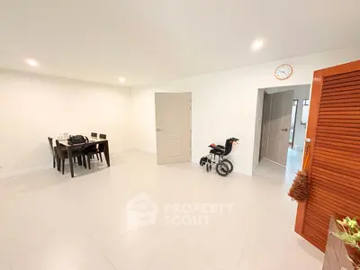 Spacious dining area with modern furniture and neutral tones