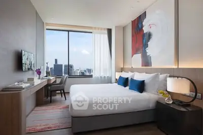 Luxurious modern bedroom with city view, stylish decor, and natural light.