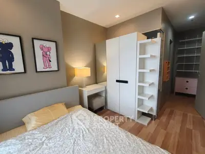 Cozy bedroom with modern decor and ample storage space