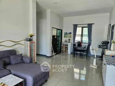 Spacious modern living room with elegant decor and ample natural light