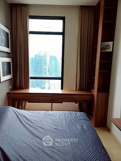 Modern bedroom with city view and stylish wooden furniture