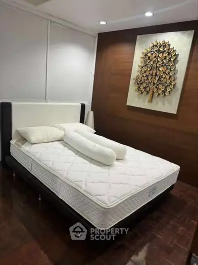 Luxurious bedroom with elegant decor and comfortable bed