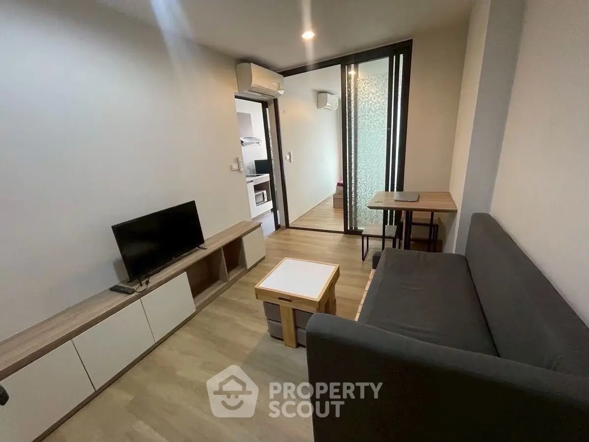 Modern living room with sleek furniture and open layout