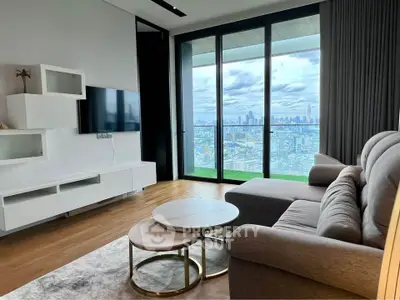 Modern living room with stunning city view and elegant furniture.