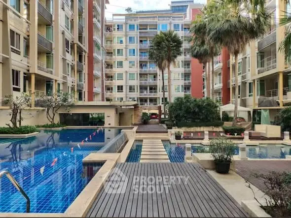 Luxurious condominium with stunning pool and modern architecture